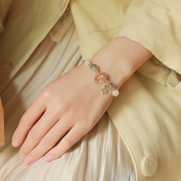 能量水晶手鍊 – 月光石金髮晶｜招財．愛情．人緣．柔性